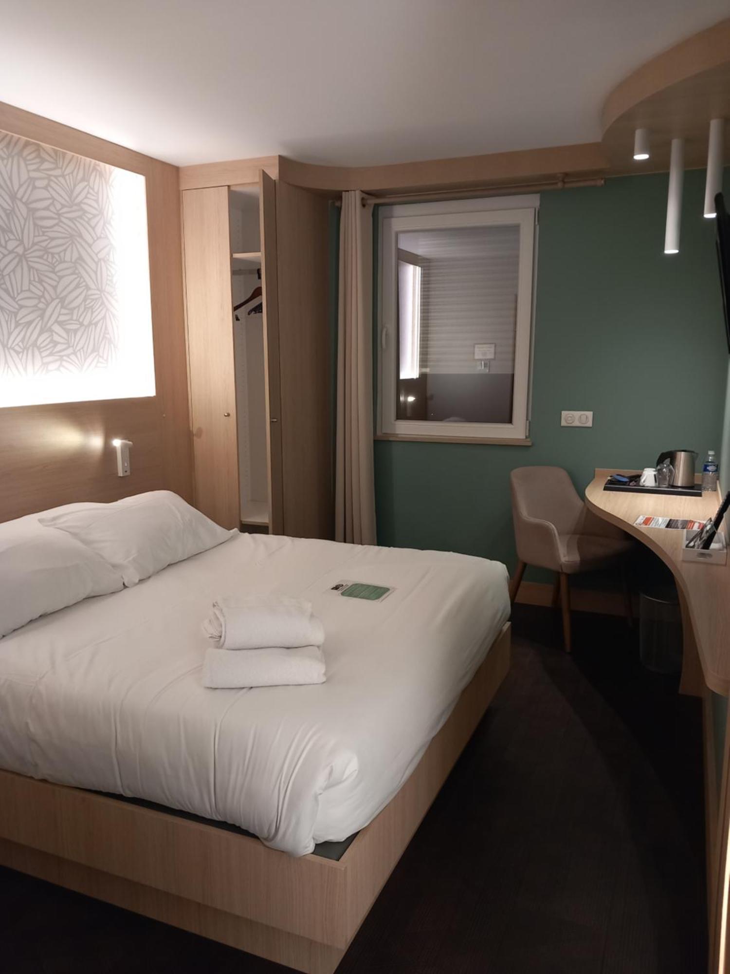Hotel Aster Restaurant Aux Arcades Briey Exterior foto